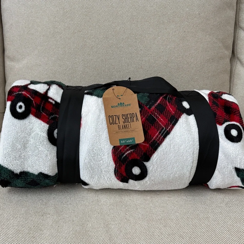 Cozy Holiday Blanket with Red and Black Plaid Design